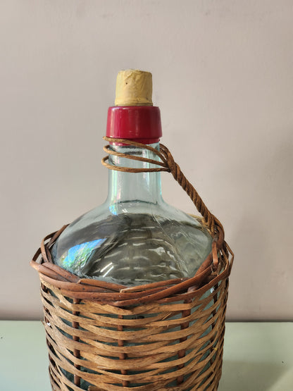 Bouteille dame-jeanne avec rotin   Patine