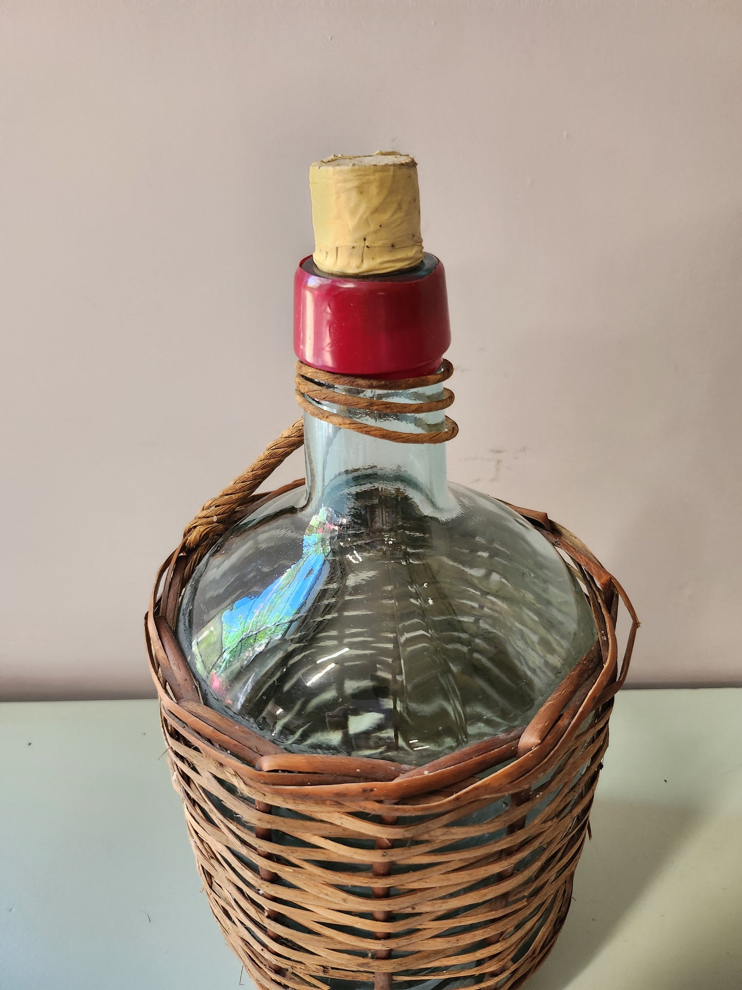 Bouteille dame-jeanne avec rotin   Patine