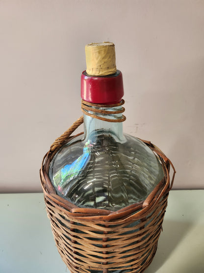 Bouteille dame-jeanne avec rotin   Patine