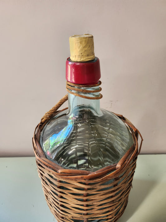 Bouteille dame-jeanne avec rotin   Patine