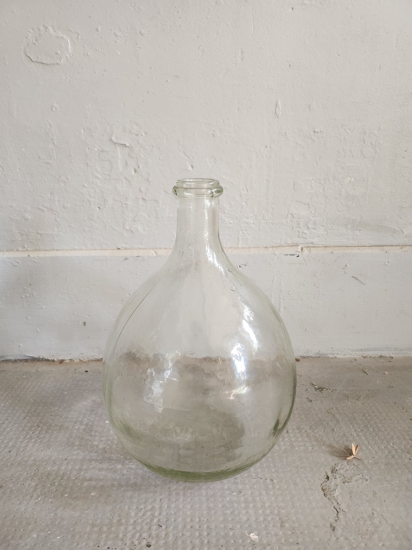 Dame-jeanne en verre transparent   Patine