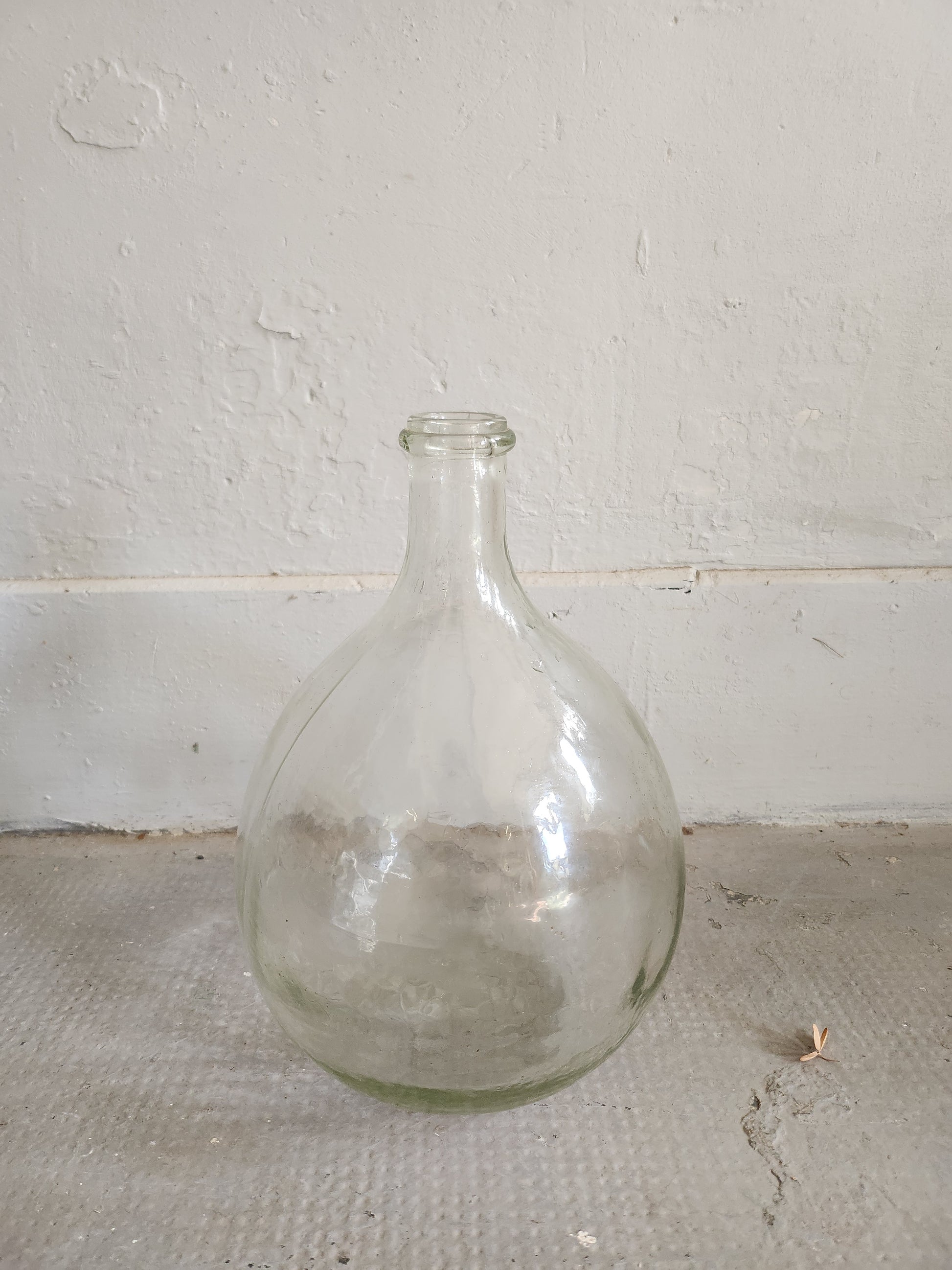 Dame-jeanne en verre transparent   Patine