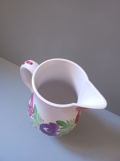 Cruche en faïence de Sarreguemines à motif floral   Patine