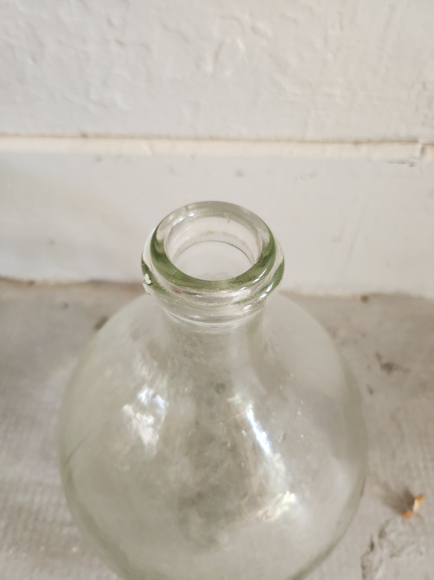 Dame-jeanne en verre transparent   Patine