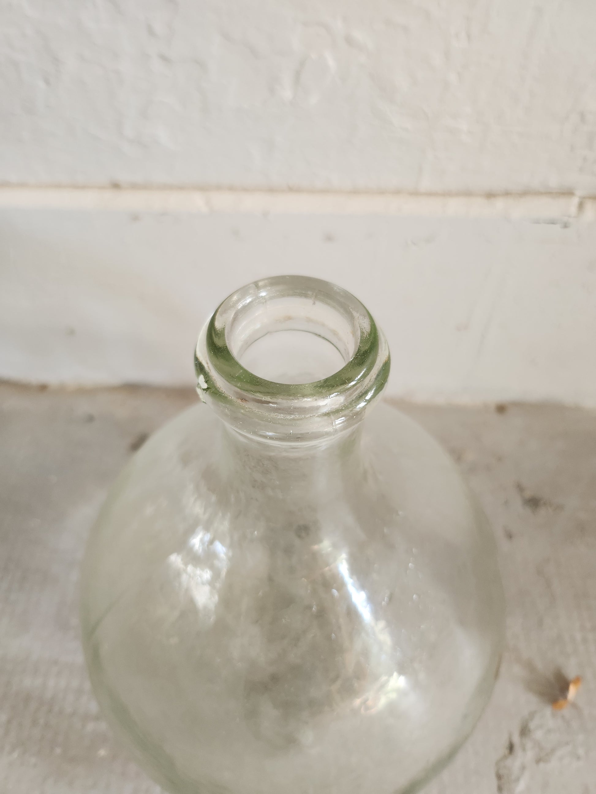 Dame-jeanne en verre transparent   Patine