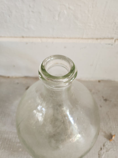 Dame-jeanne en verre transparent   Patine