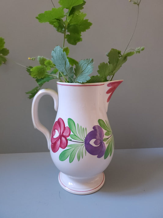 Cruche en faïence de Sarreguemines à motif floral   Patine