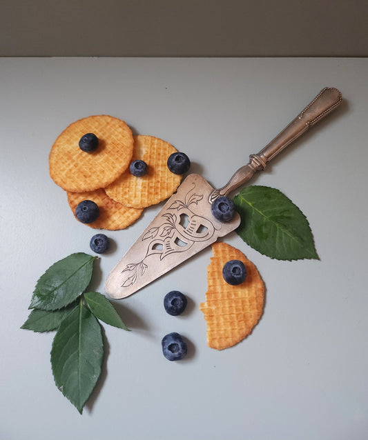 Pelle à tarte en argenterie   Patine
