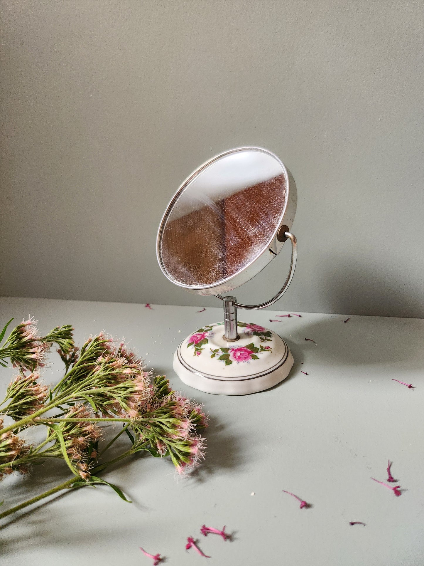 Petit miroir en porcelaine   Patine