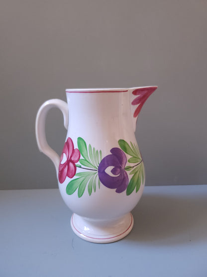 Cruche en faïence de Sarreguemines à motif floral   Patine